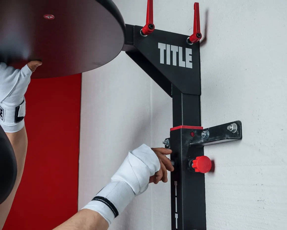 TITLE Boxing Fold-Away Adjustable Speed Bag Platform 2.0
